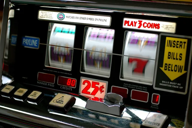 Classic three-reel slot machine with coin tray