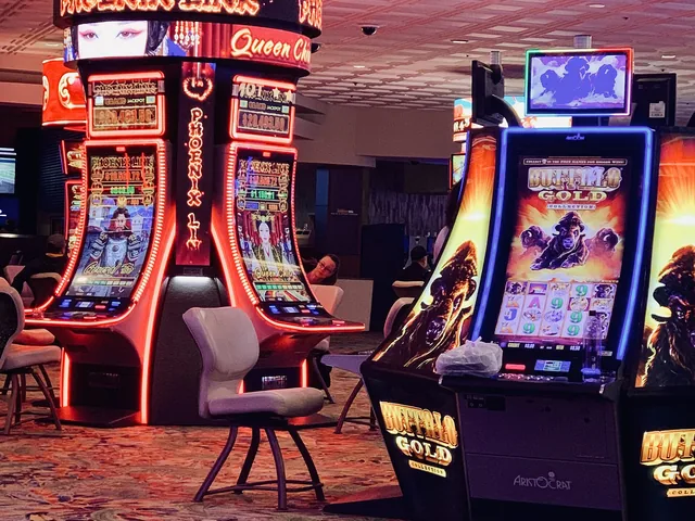 Row of slot machines on a casino floor