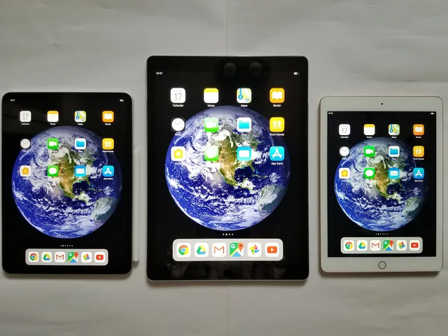 Three iPad tablets of different sizes side by side