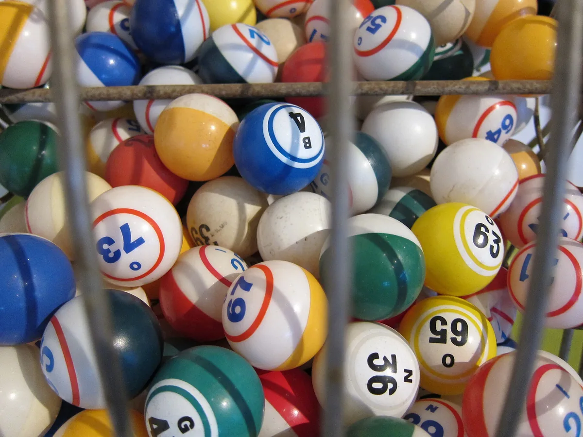 Numbered balls inside a lottery drum