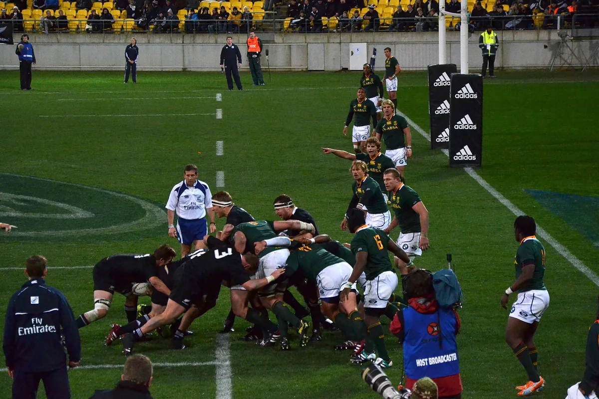 Springboks and All Blacks packing down in a scrum